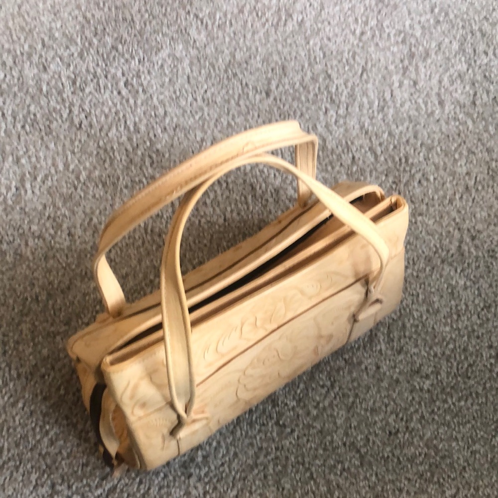 SOLD. Hand tooled buttercream bag